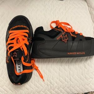 black with orange naked wolf special edition. new never worn. price negotiable
